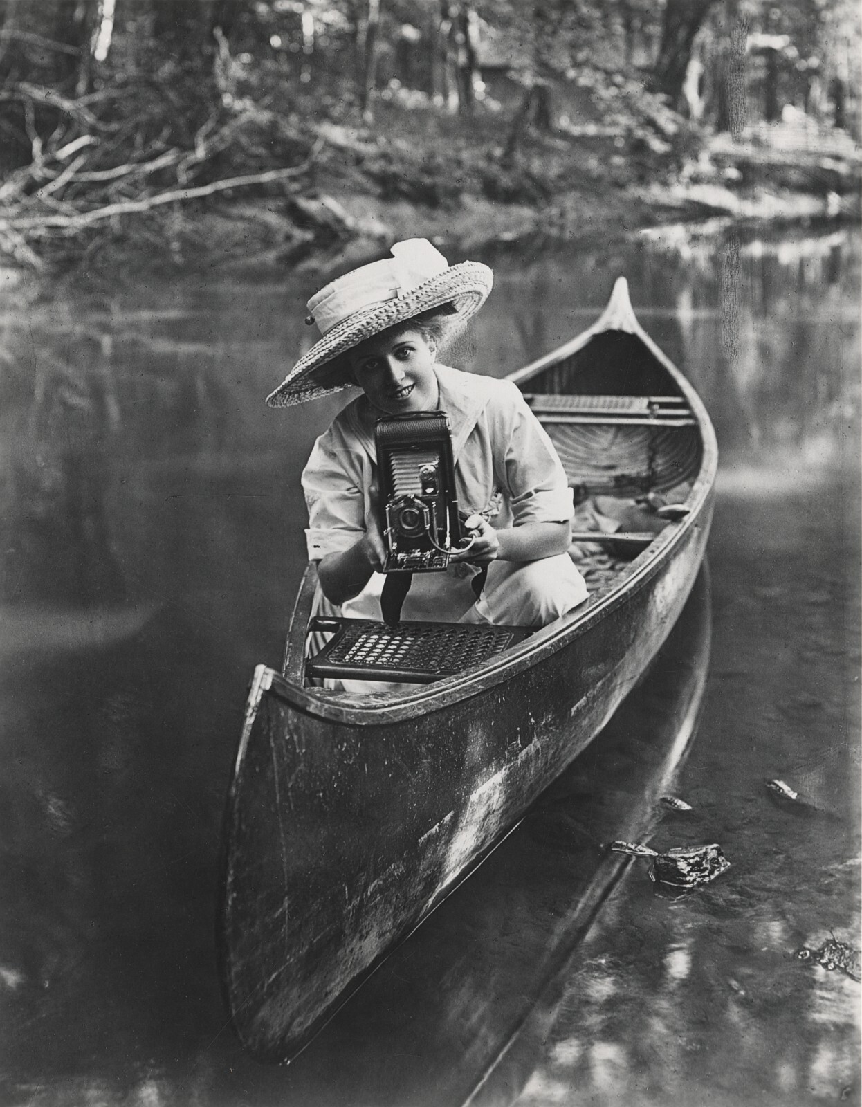 1909 Women in Canoe with Camera Photograph (printed c. 1960\'s) 1909 Women in Canoe with Camera Photograph (printed c. 1960\'s)