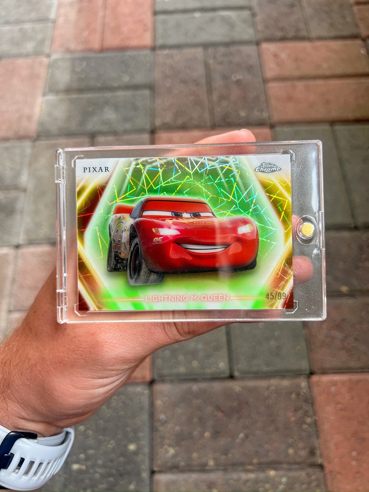 2026 Topps Disney Neon Chrome Pixar Lightning McQueen Refractor /99