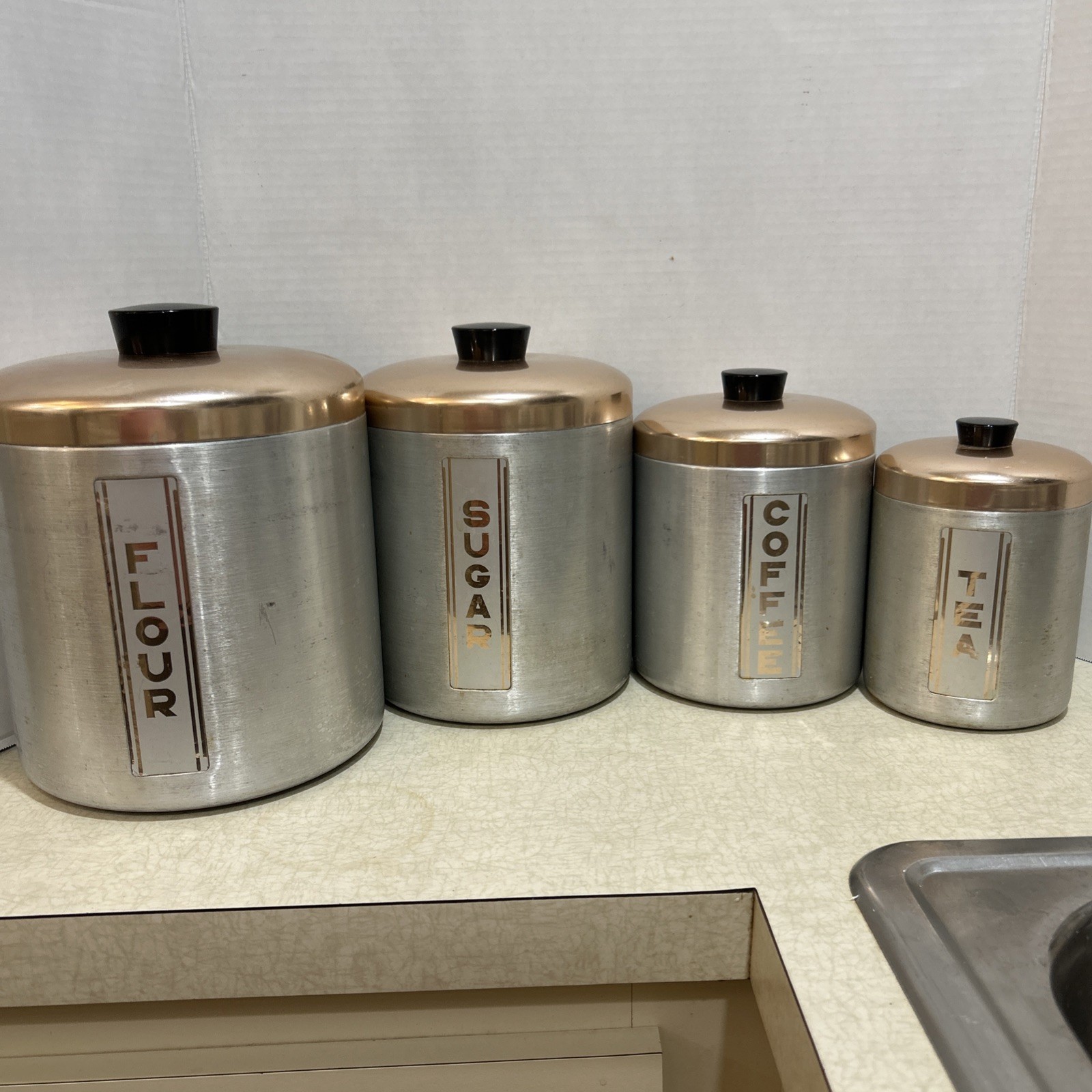 Vintage MCM Set of 4 Spun Aluminum Maid Of Honor Canisters with Copper Lids Vintage MCM Set of 4 Spun Aluminum Maid Of Honor Canisters with Copper Lids
