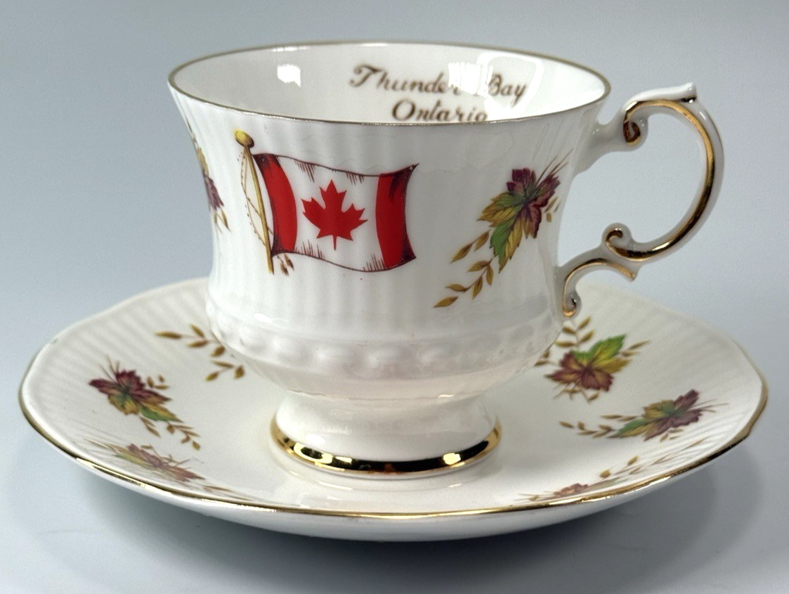 Elizabethan Fine Bone China England Teacup & Saucer Flag & Maple Leaf of Canada Elizabethan Fine Bone China England Teacup & Saucer Flag & Maple Leaf of Canada