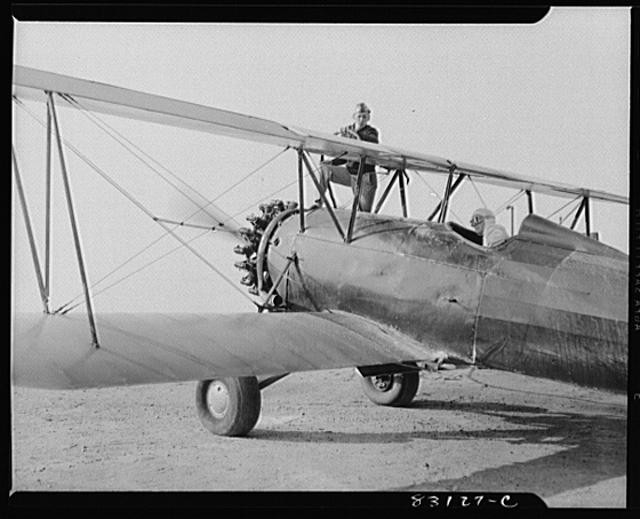 Photo:Bridgeton New Jersey 1942 biplane aircraft pilot ground crew FSA