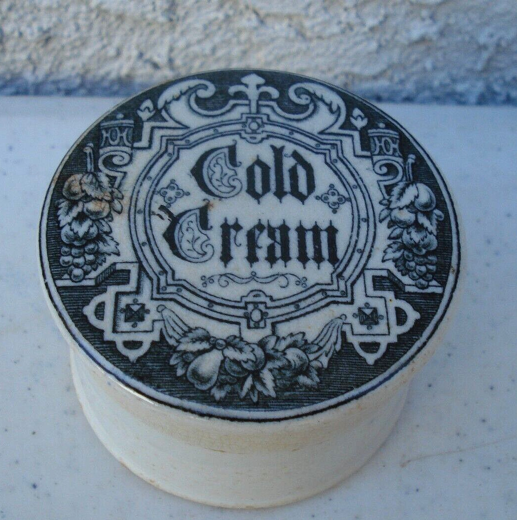 Antique, Gothic print Cold Cream featuring fruit and scroll border, jar, pot lid