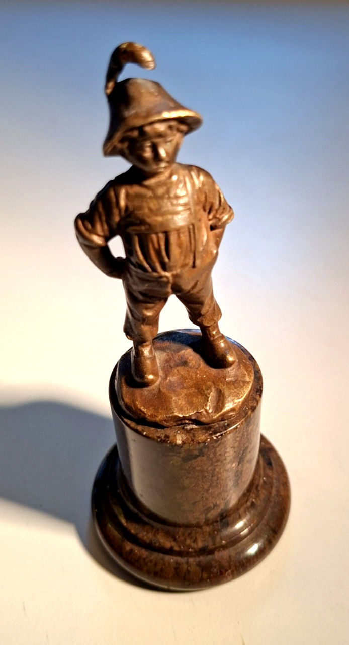 Antique Bronze Cast Figure of a boy wearing a hat with a feather 20-30s, Germany