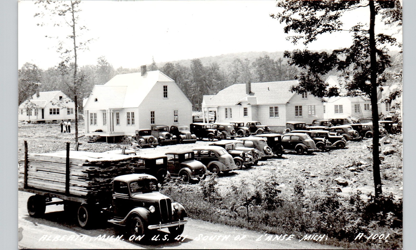 TRUCK HAULS LUMBER, alberta mi. c1940 postcard michigan real photo rppc birdseye
