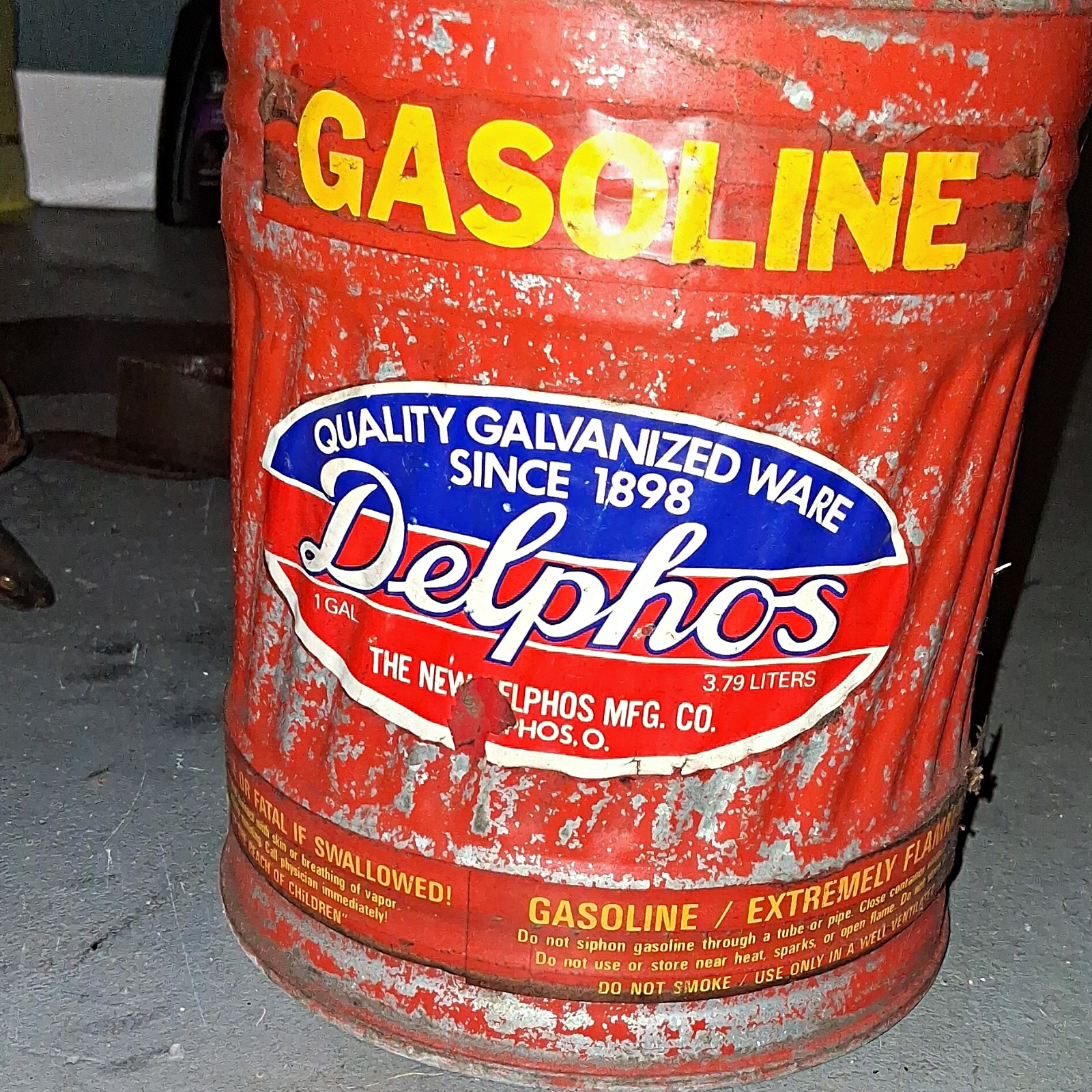Delphos 1 Gal Gasoline Advertising Can - Gas & Oil Theme, Red Yellow Blue White Delphos 1 Gal Gasoline Advertising Can - Gas & Oil Theme, Red Yellow Blue White