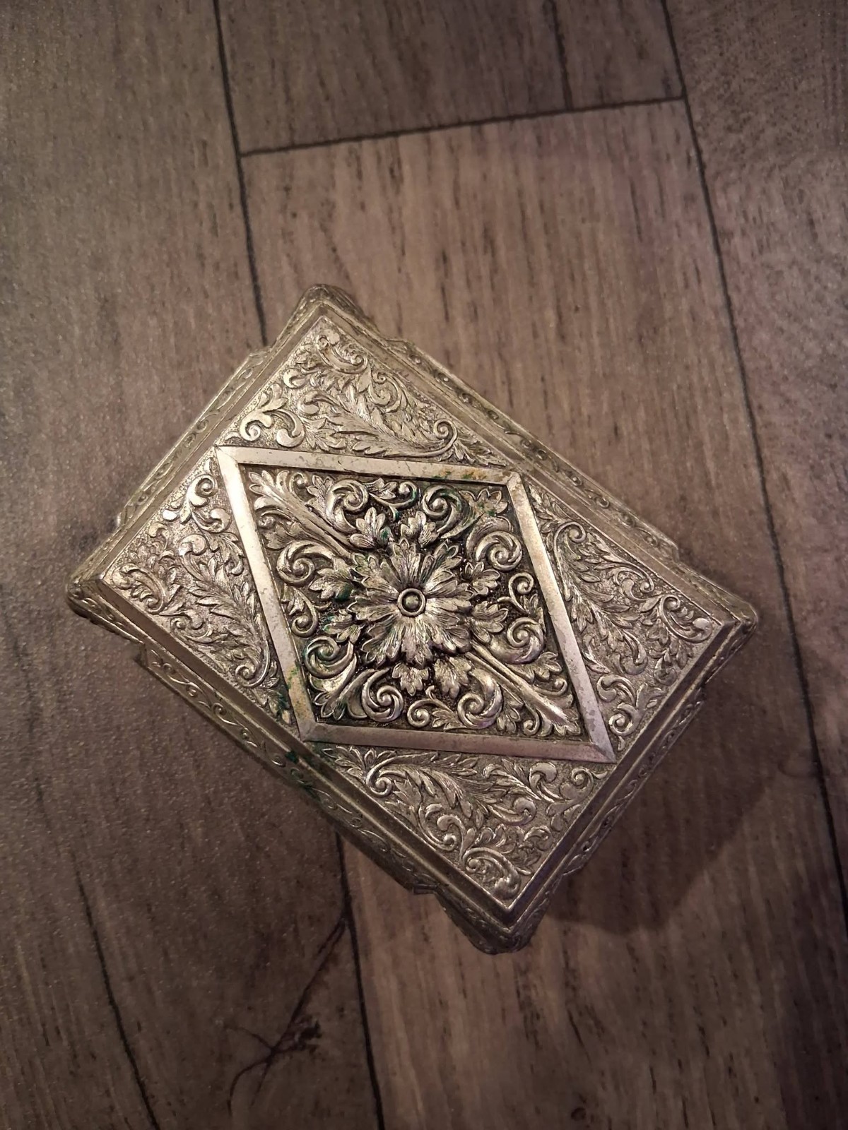 Antique ornate silver plated 1920\'s in good condition cigarette/trinket box.