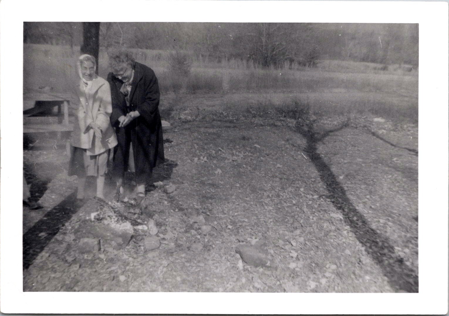 Elderly Women Warming Hands by Campfire, 1950s Outdoor B&W Snapshot Photo