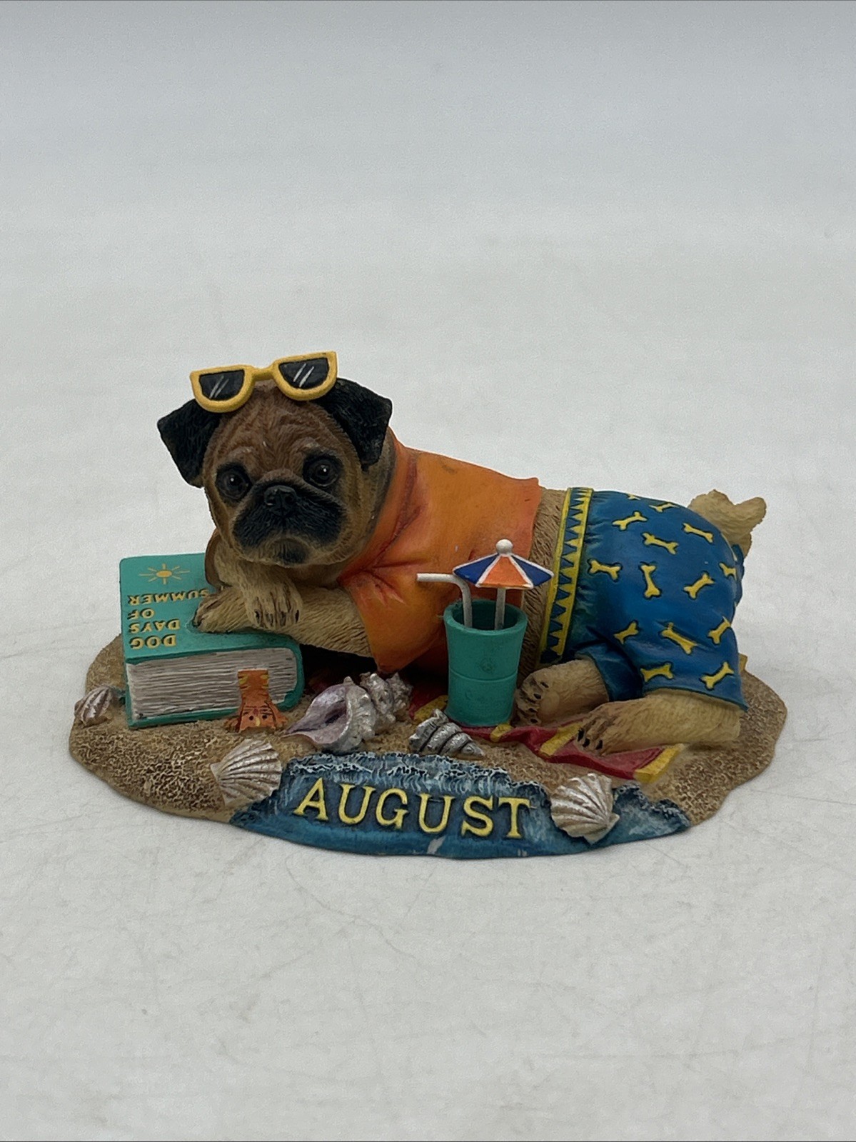 Danbury Mint Pug Perpetual Calendar Figurine of the Month Figure August Beach Danbury Mint Pug Perpetual Calendar Figurine of the Month Figure August Beach