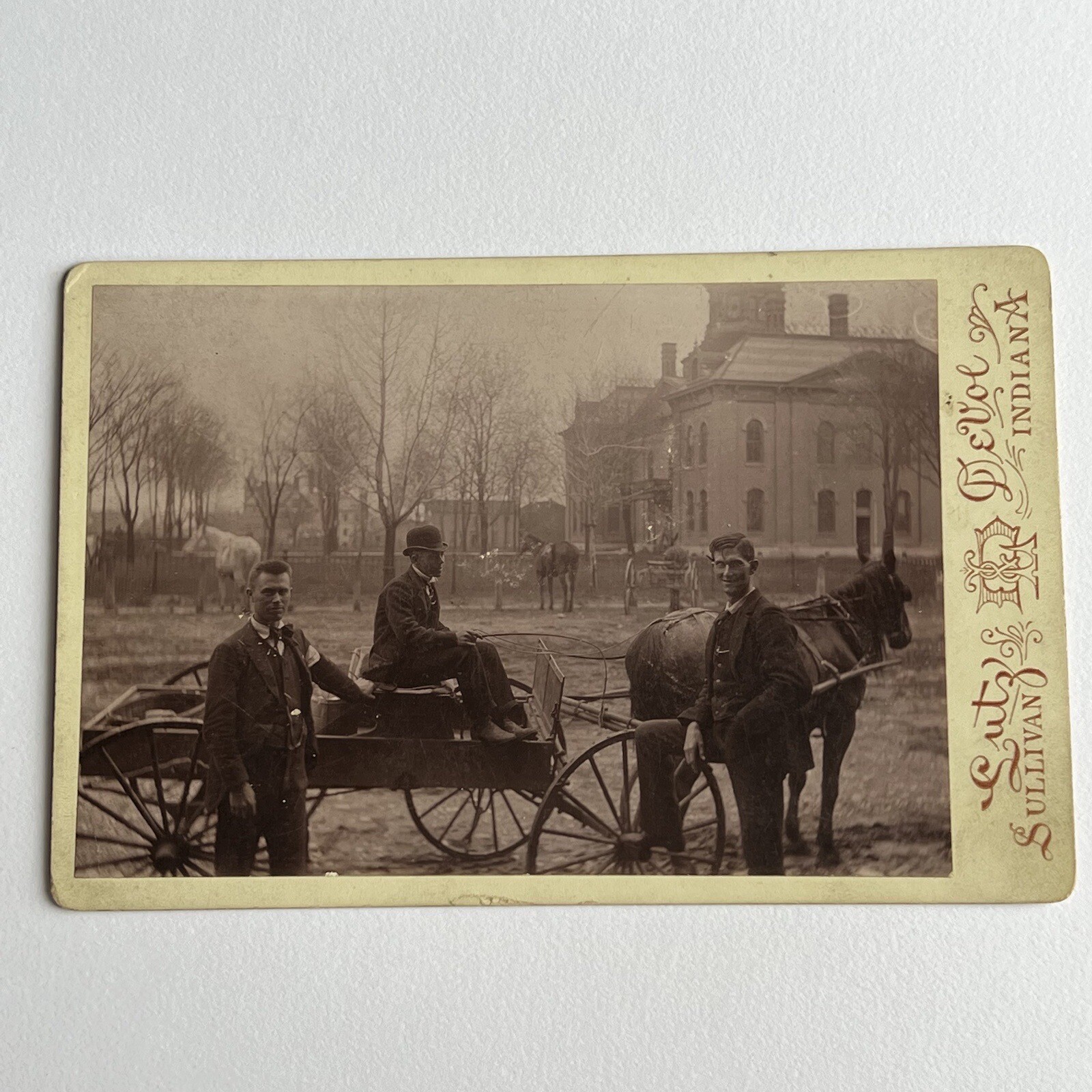 Antique Cabinet Card Photograph Handsome Men On Wagon Street View Sullivan IN