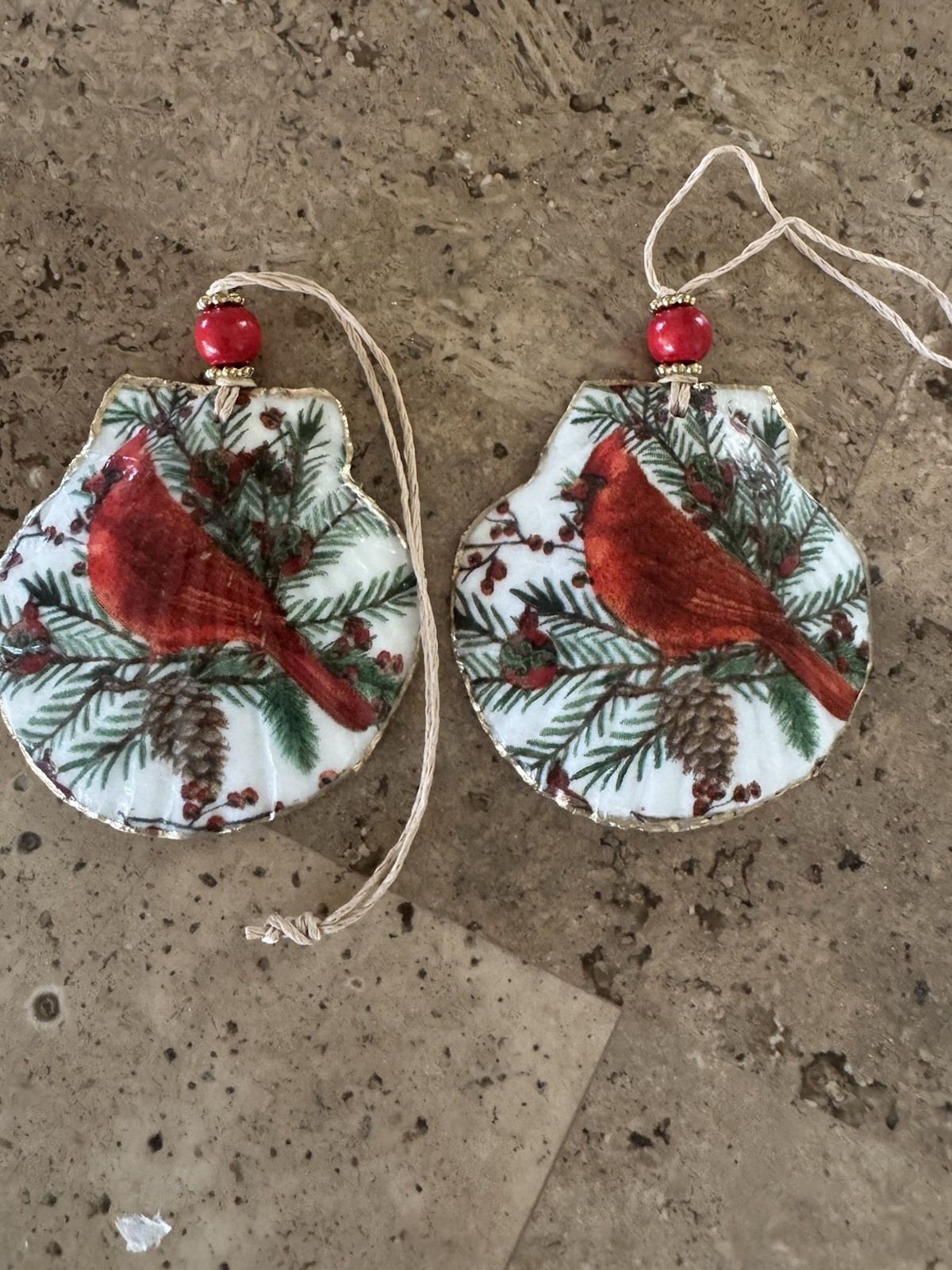 Decoupaged set of two seashell Ornaments with RED CARDINALS