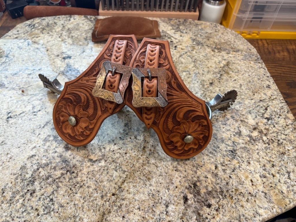 VIntage Silver Spurs w/ custom made straps and handmade buckles.