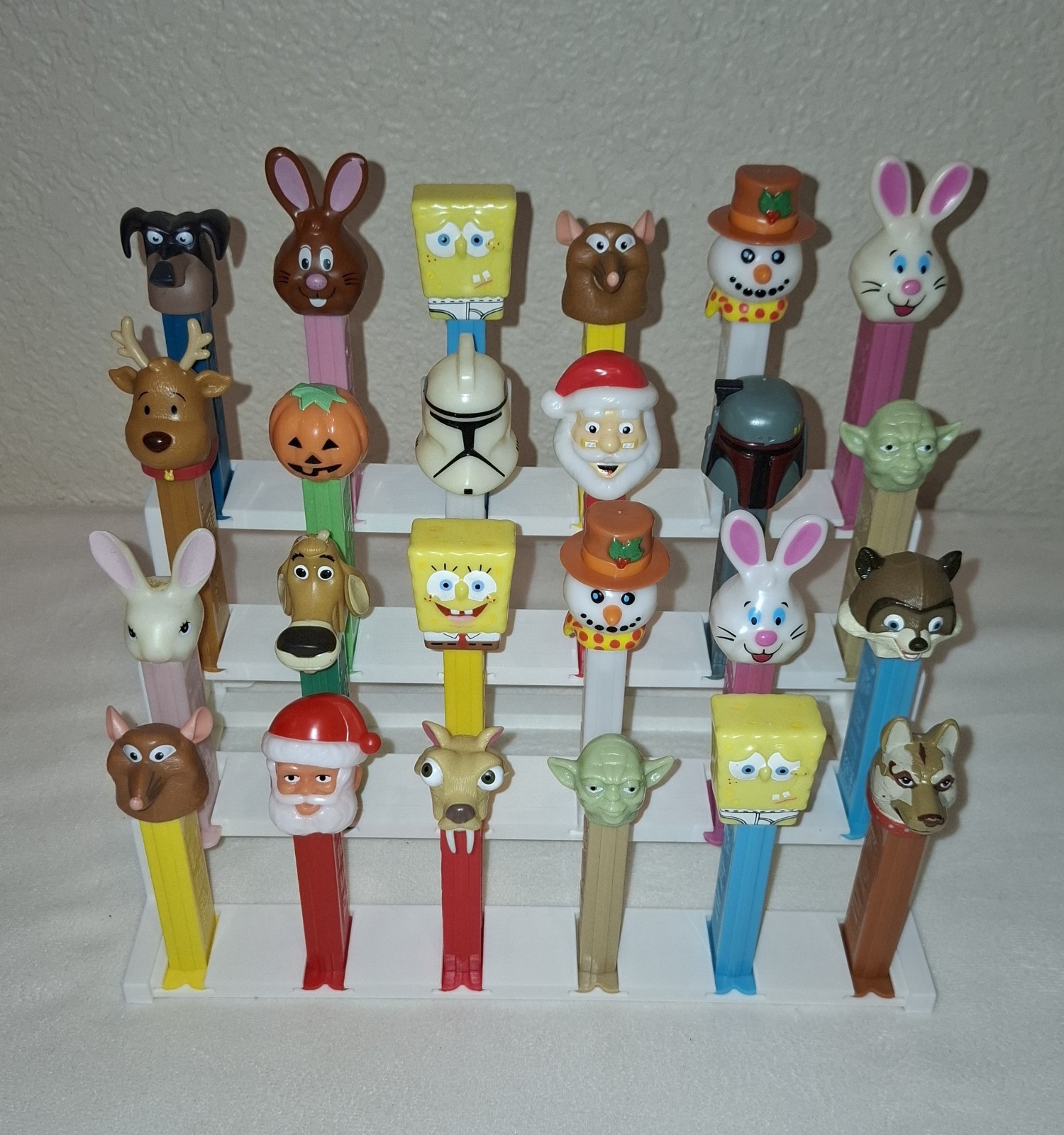 4 Teir PEZ Display Holds 24 PEZ. Color is White - Dispensers Not Included 4 Teir PEZ Display Holds 24 PEZ. Color is White - Dispensers Not Included