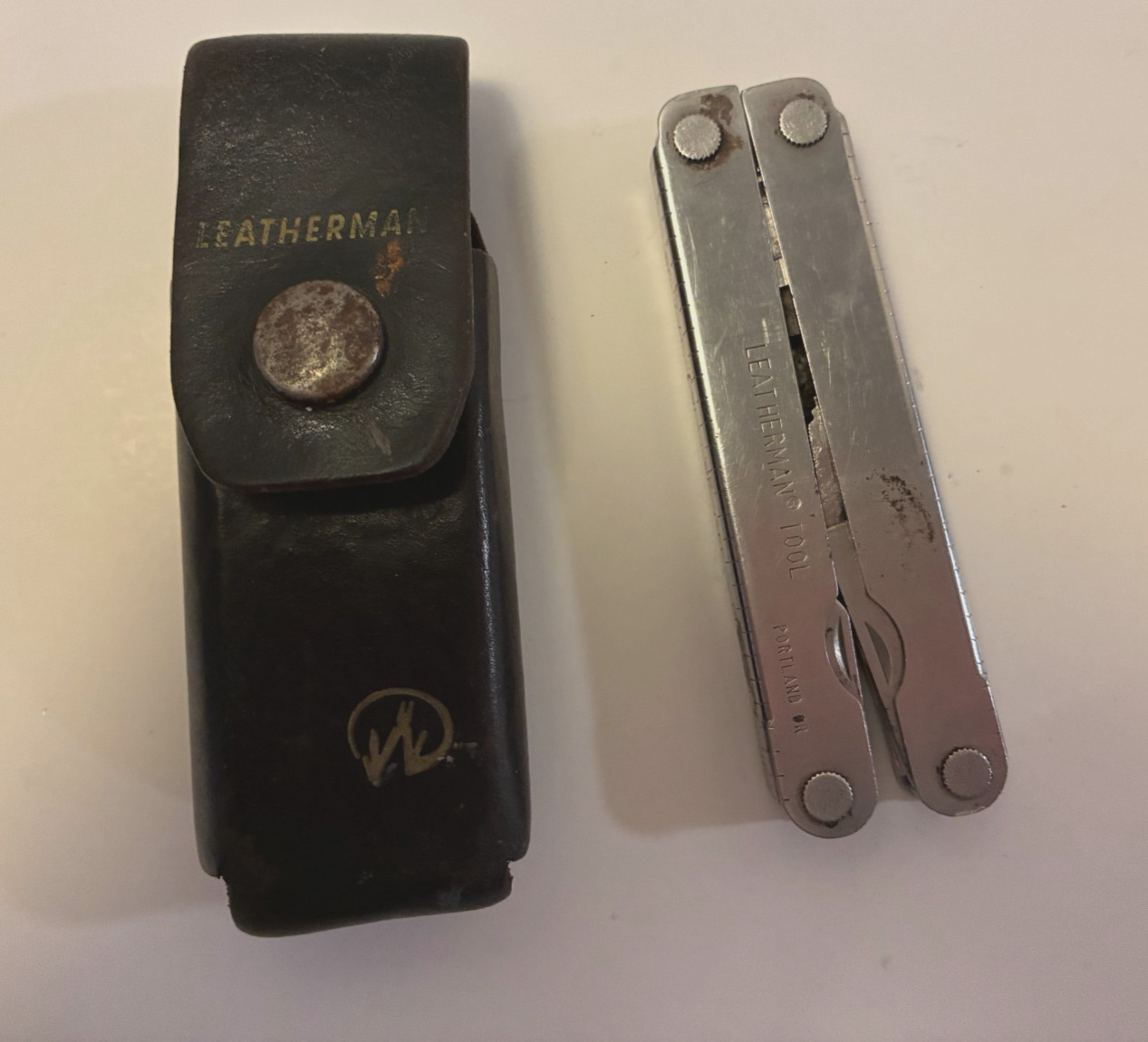 LEATHERMAN KNIFE ...VINTAGE...STAINLESS STEEL JUST NEEDS CLEANING