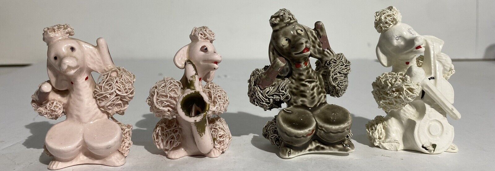 Vintage Spaghetti Poodles. 4 Total. Pink, Gray And White. Playing Instruments.