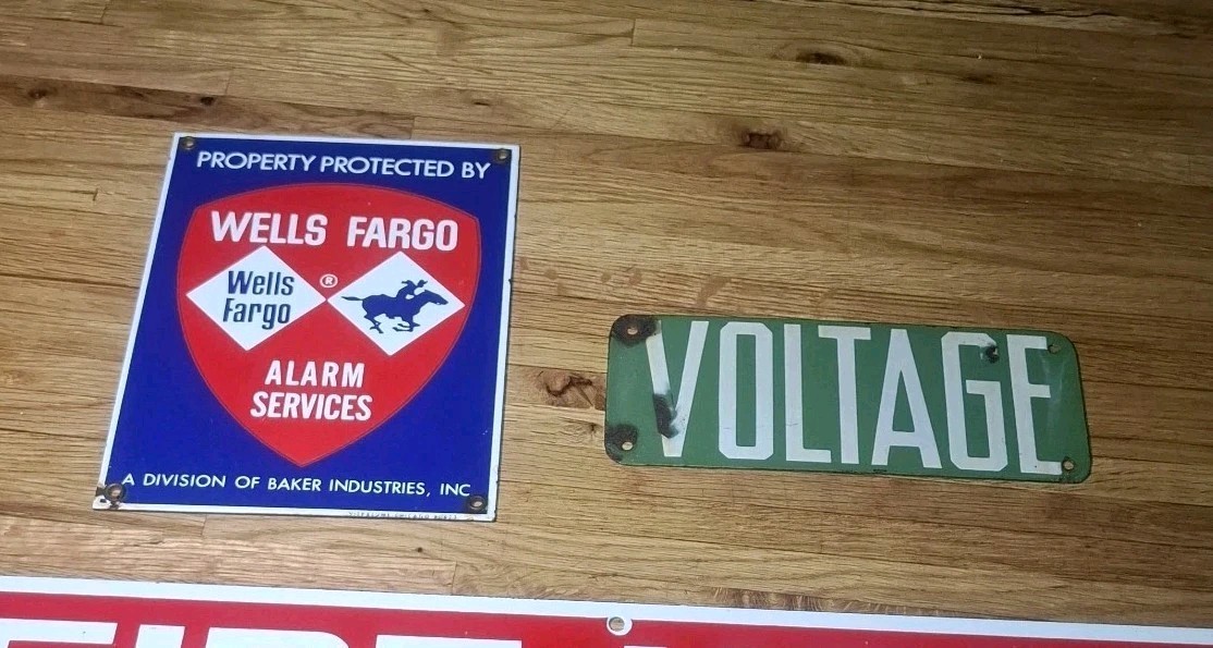 Lot Of 2 Vintage Enameled Porcelain Signs Wells fargo Voltage Lot Of 2 Vintage Enameled Porcelain Signs Wells fargo Voltage