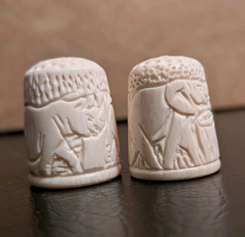 Pair of White Carved Bovine Bone Scene Sewing Thimbles, Saharan Animal Motif Pair of White Carved Bovine Bone Scene Sewing Thimbles, Saharan Animal Motif