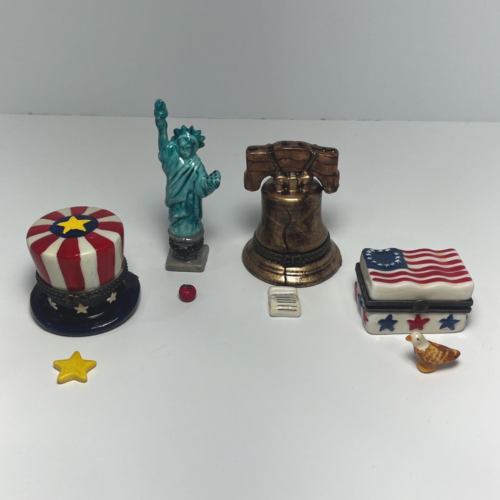 Vintage Patriotic Porcelain Hinged Trinket Box Lot 4pc. Hat, Liberty, Bell, Flag Vintage Patriotic Porcelain Hinged Trinket Box Lot 4pc. Hat, Liberty, Bell, Flag