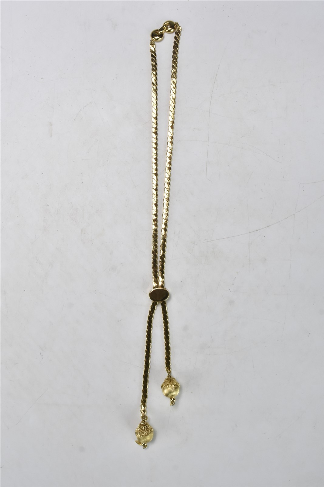 Vintage MONET GOLD TONE HERRINGBONE CHAIN BOLO NECKLACE #08040