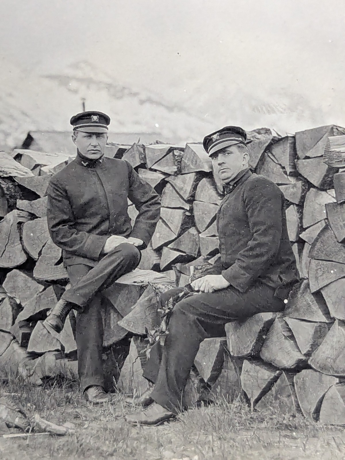 ​Antique RPPC Men in Uniform Peaked Caps Firewood Stack Mountain Views 1907-1914