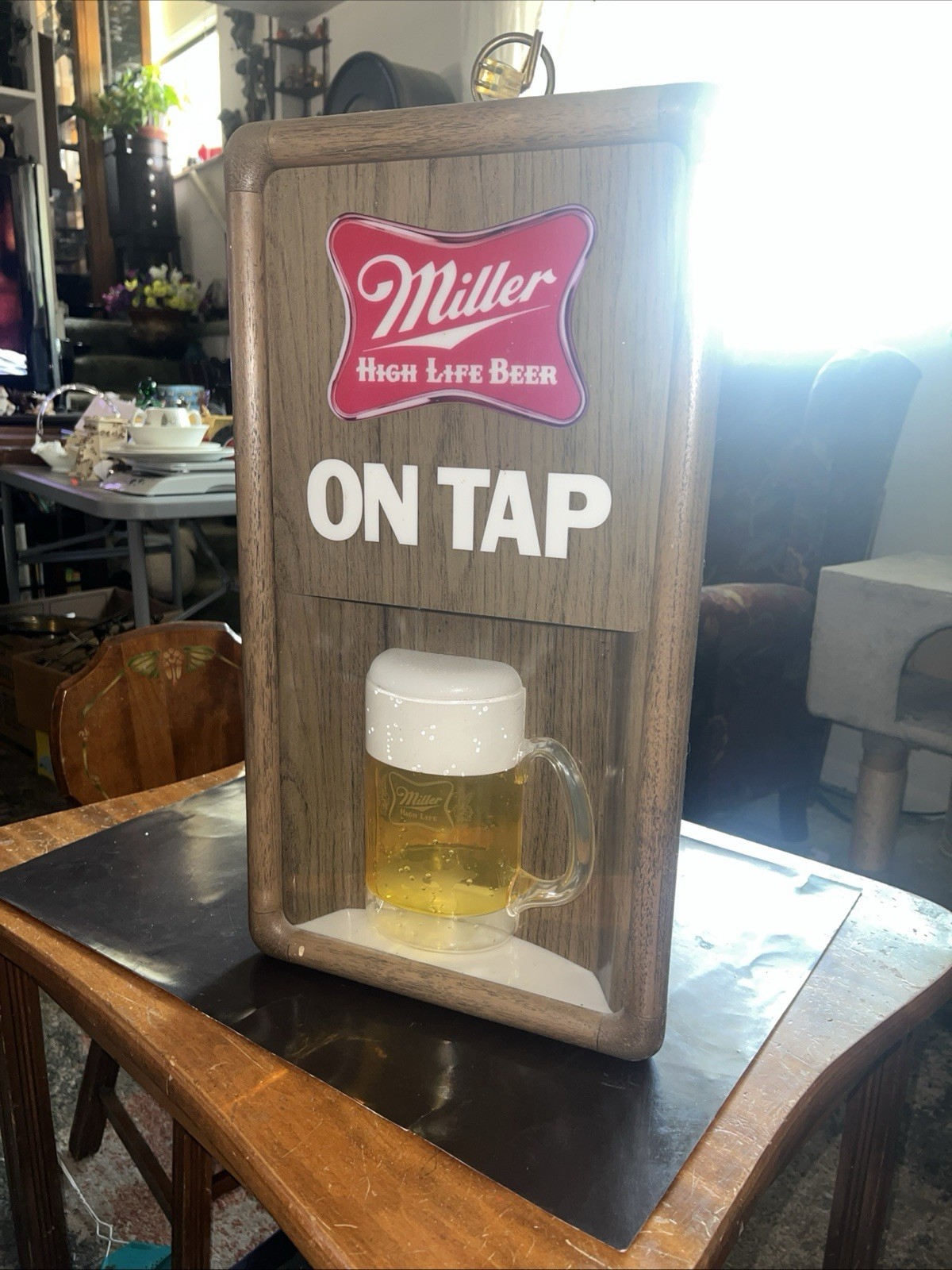 Vintage 1980s Miller High Life Beer On Tap Hanging Rotating Lighted Motion Sign Vintage 1980s Miller High Life Beer On Tap Hanging Rotating Lighted Motion Sign
