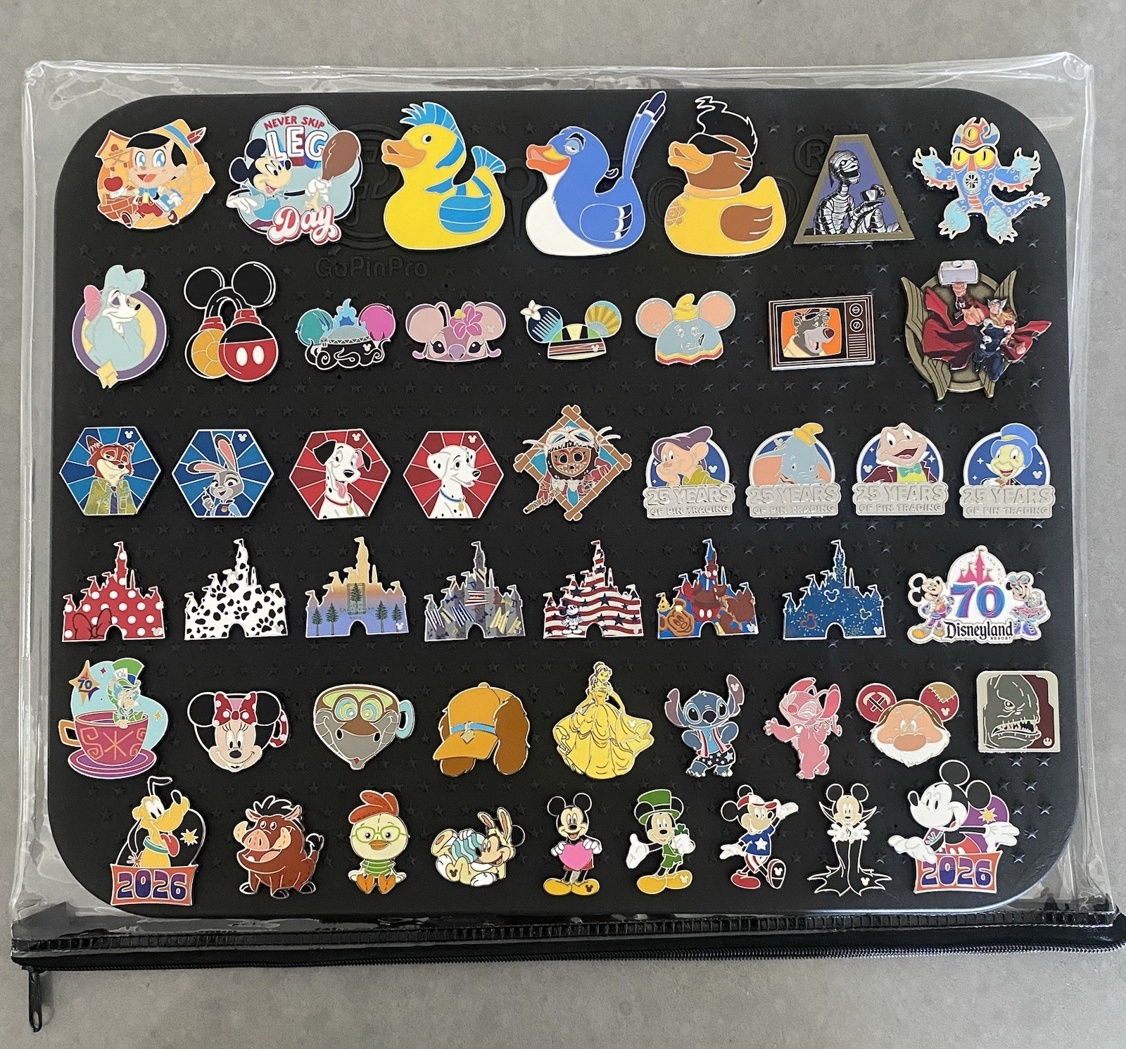 50 Authentic Diamond Disney Pins Lot with Board and Cover - No Duplicates 50 Authentic Diamond Disney Pins Lot with Board and Cover - No Duplicates