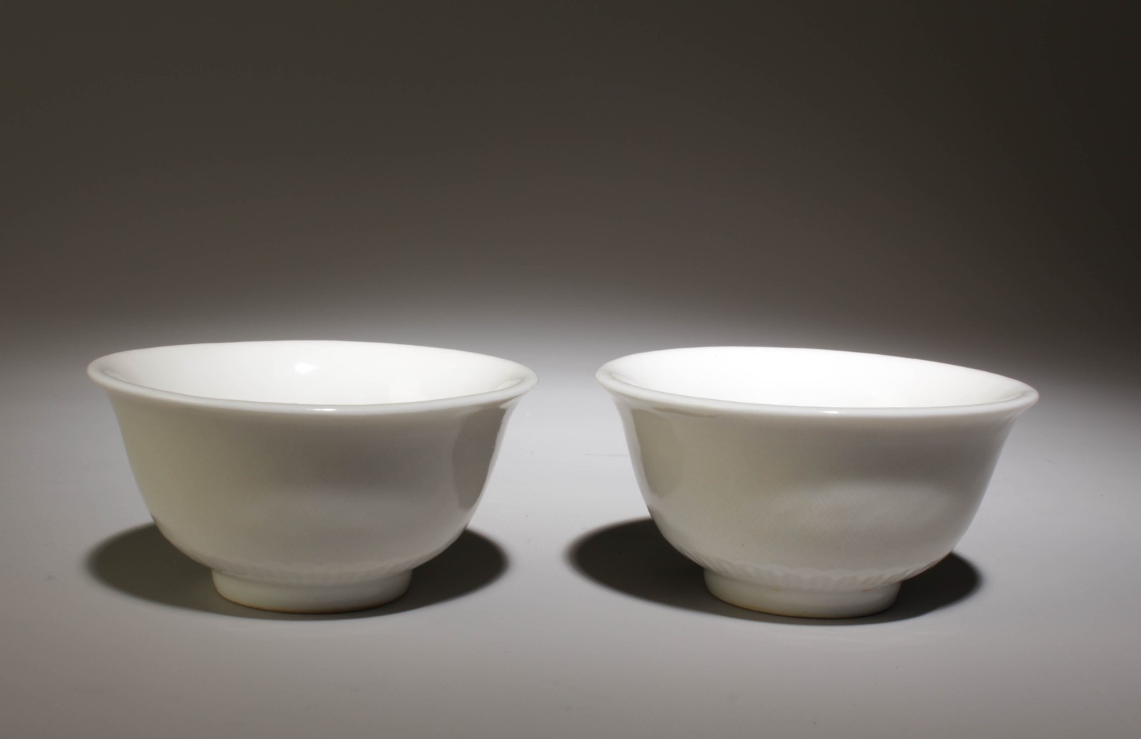A Pair of White Glazed Cups. 