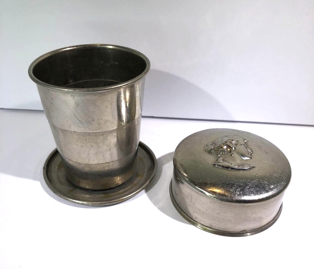 Vintage Early Century Telescoping Collapsible Metal Tin Drinking Cup With Woman Vintage Early Century Telescoping Collapsible Metal Tin Drinking Cup With Woman