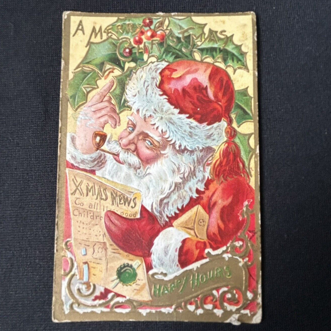 Vtg 1909 Embossed Christmas Postcard Santa Reading Xmas News Smoking Pipe Gold