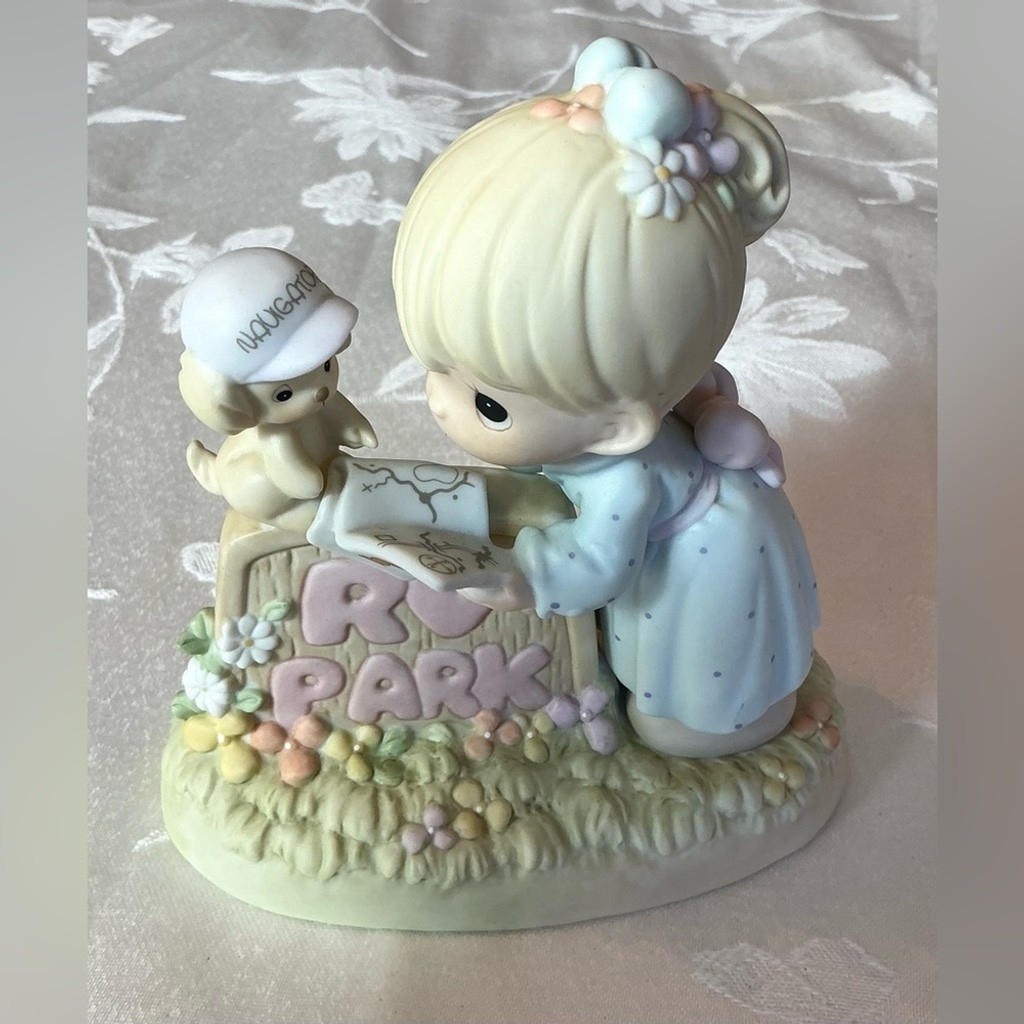 Adorable Precious Moments figurine titled 