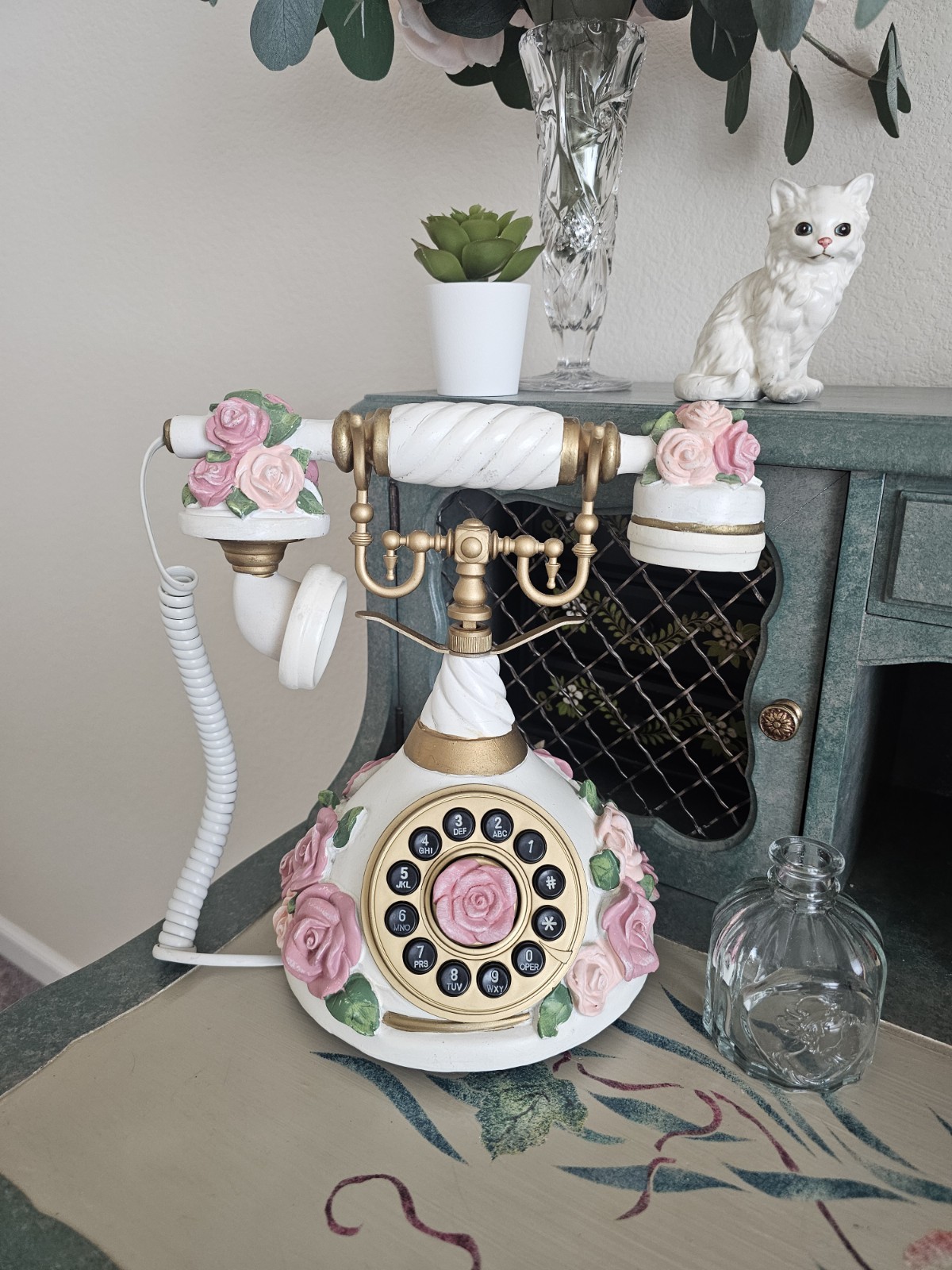 Rare vintage-style landline phone white and gold finish, w pink porcelain roses. Rare vintage-style landline phone white and gold finish, w pink porcelain roses.