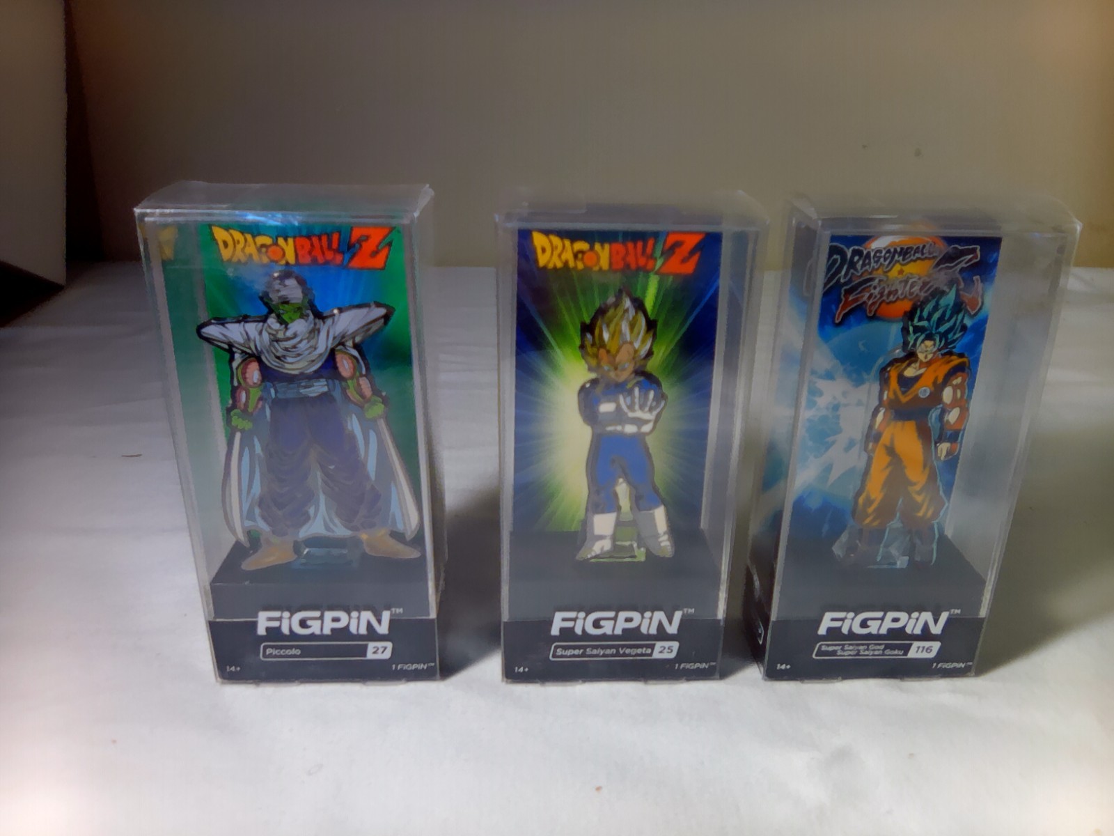 FiGPiN Dragon Ball Z / Vegeta #23-Piccolo #27- Blue Goku #116 (3 for 1 price) FiGPiN Dragon Ball Z / Vegeta #23-Piccolo #27- Blue Goku #116 (3 for 1 price)