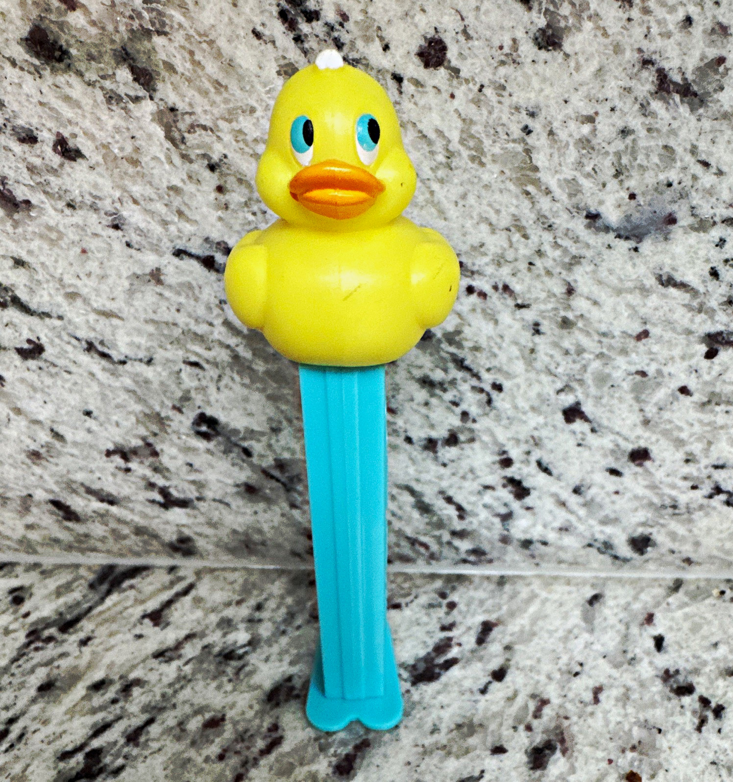 PEZ Yellow Duck Silo relic Candy Dispenser with Blue Stem PEZ Yellow Duck Silo relic Candy Dispenser with Blue Stem