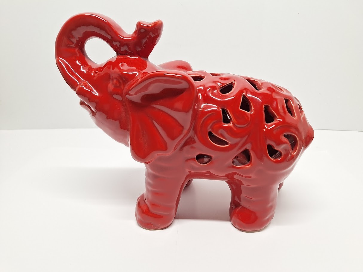 Red Ceramic Elephant Figurine in Excellent Used Condition 7.5”T x 9”L x 4”W Red Ceramic Elephant Figurine in Excellent Used Condition 7.5”T x 9”L x 4”W