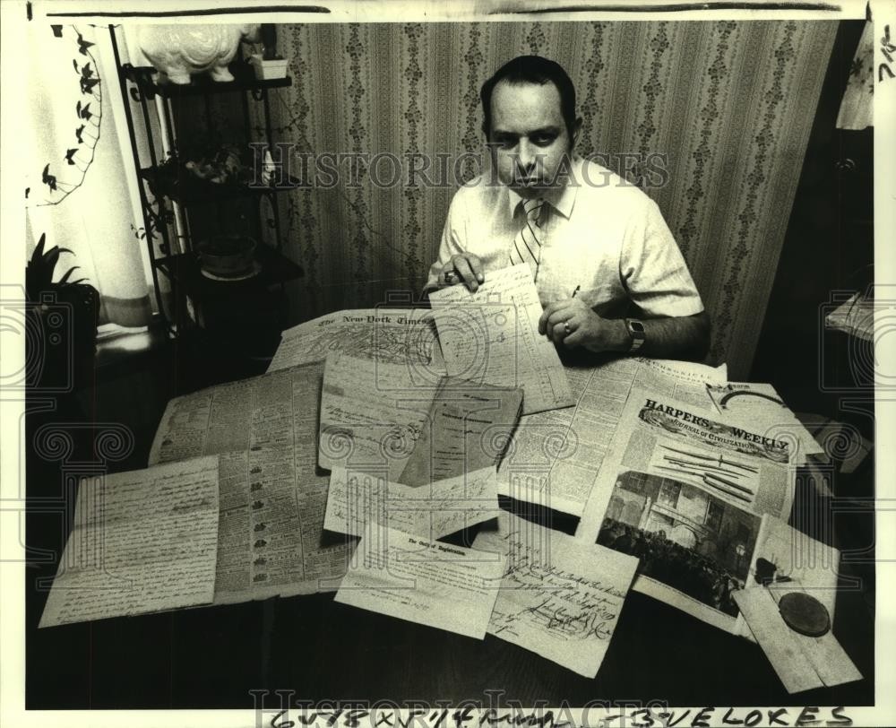 1980 Press Photo Kerry Delery of Metairie exhibits some of his antique documents 1980 Press Photo Kerry Delery of Metairie exhibits some of his antique documents