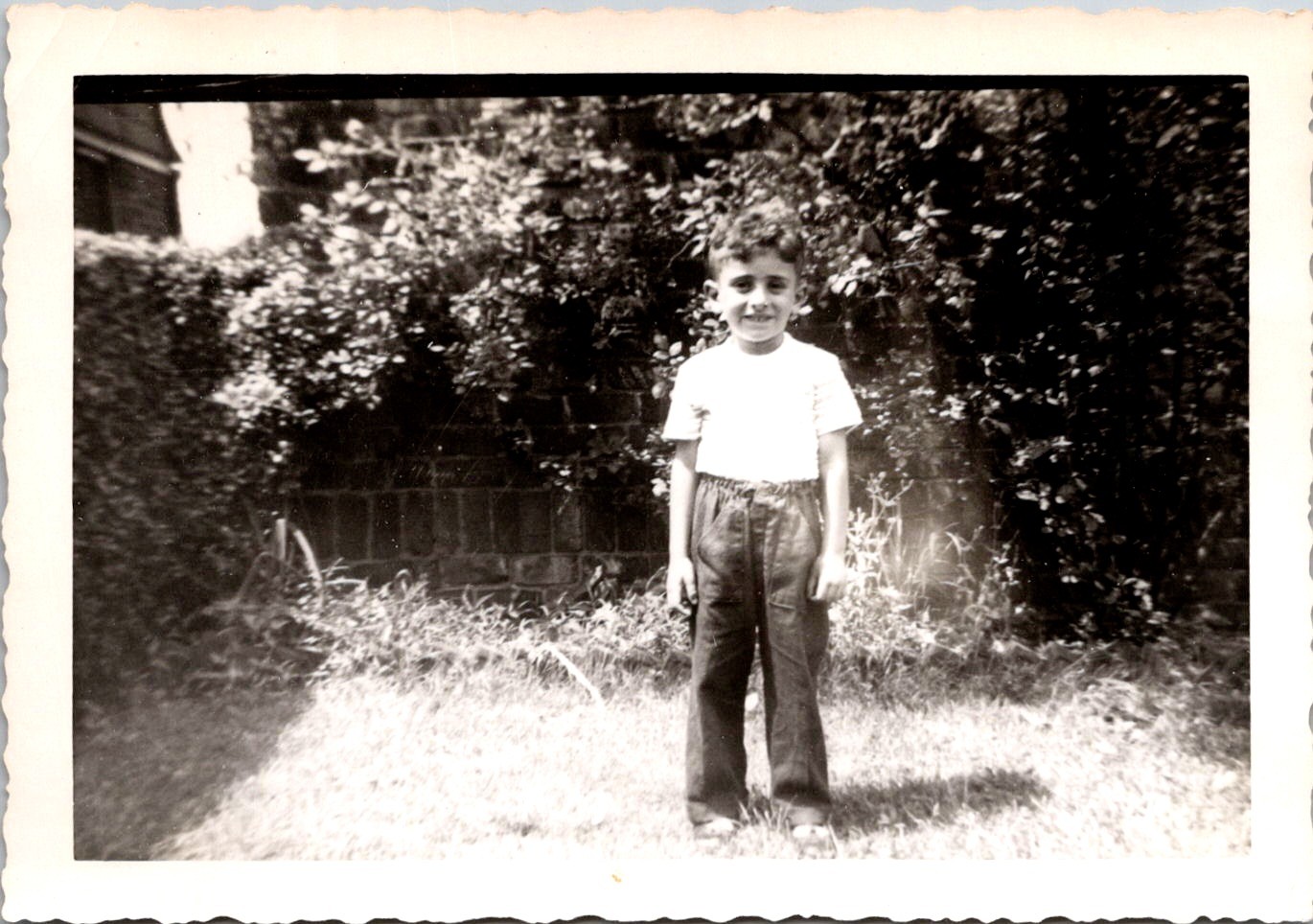 Smiling Young Boy in Backyard Garden, July 1950 Vintage Snapshot Photo Smiling Young Boy in Backyard Garden, July 1950 Vintage Snapshot Photo