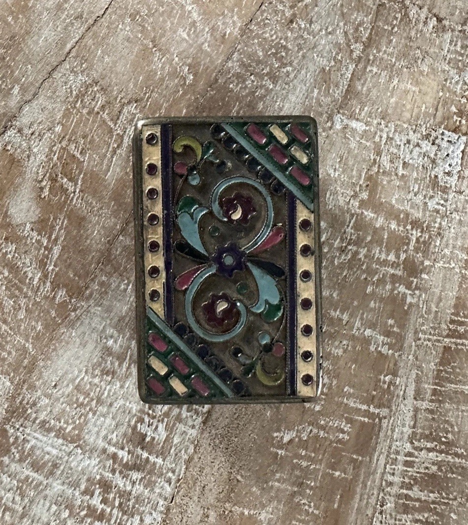 A vintage Russian silver and enamel champlevé snuff or pill box.
