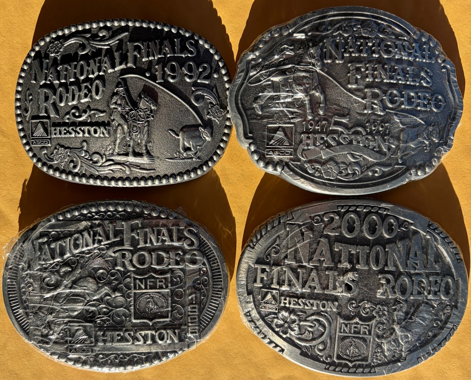 Lot of 4 1992-2000 Hesston National Finals Rodeo Adult Belt Buckles Lot of 4 1992-2000 Hesston National Finals Rodeo Adult Belt Buckles