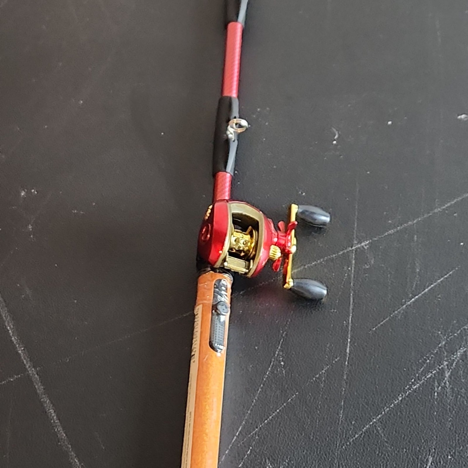 G.E.I. Bait Cast Fishing Pole BBQ Grill Lighter - Red G.E.I. Bait Cast Fishing Pole BBQ Grill Lighter - Red