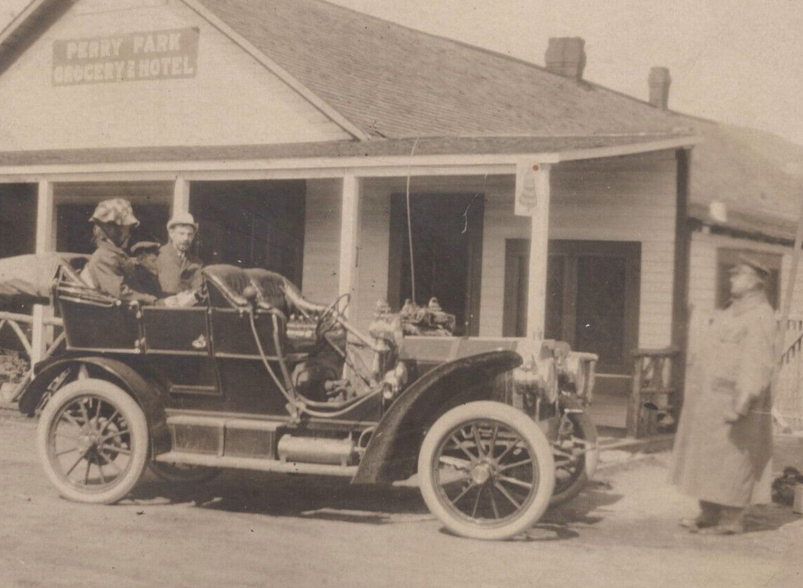 3N Photograph 1910-1920s Rare View PERRY PARK Grocery & Hotel Touring Car Driver