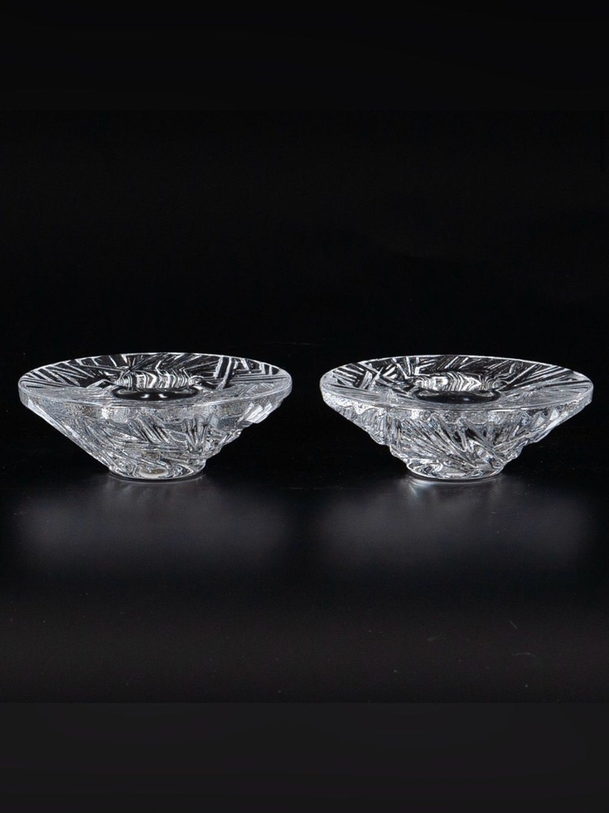 Two vintage Orrefors by Martii Rykonen snowflake votive holder. Made in Sweden.