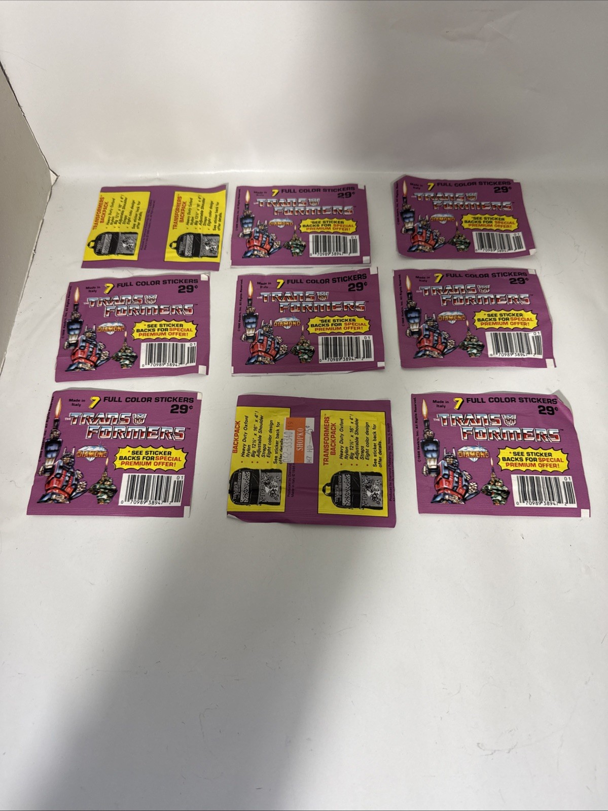 Lot of 9 - 1986 Hasbro Diamond Transformers Unopened Sticker Packs 63 Stickers Lot of 9 - 1986 Hasbro Diamond Transformers Unopened Sticker Packs 63 Stickers