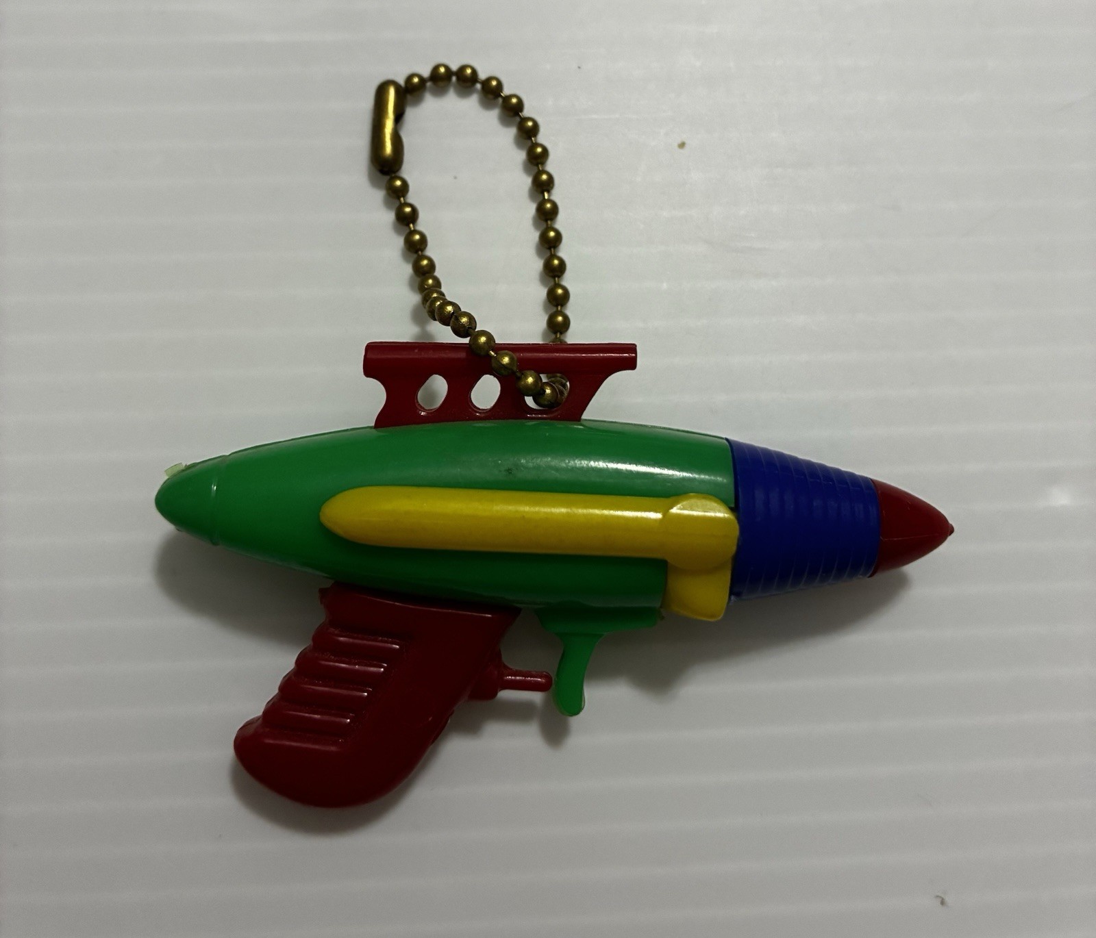 Vintage 1950’s Space Gun/Ray Gun Puzzle Keychain Vintage 1950’s Space Gun/Ray Gun Puzzle Keychain