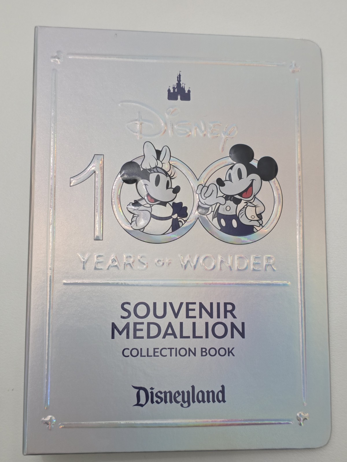 DLR Walt Disney Parks 100th Anniversary Souvenir Medallion Coin Collection Book