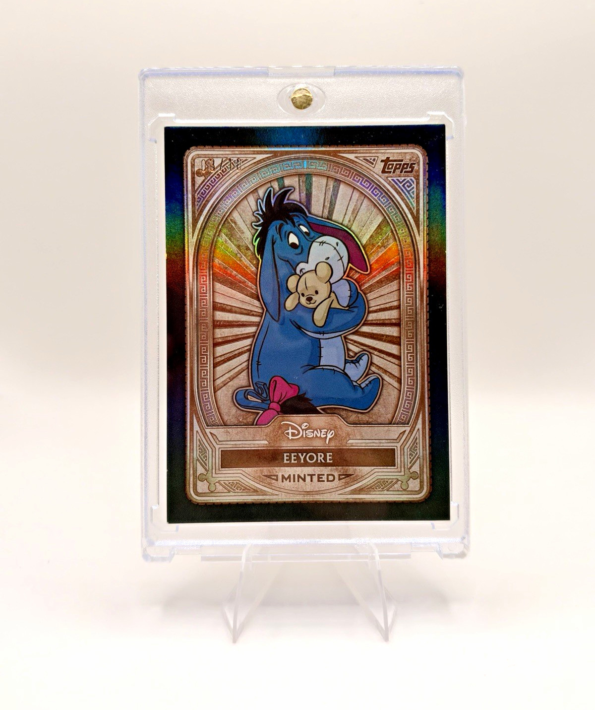 2025 Topps Disney Minted Eeyore Black Rainbow Foil - numbered 03/10 2025 Topps Disney Minted Eeyore Black Rainbow Foil - numbered 03/10