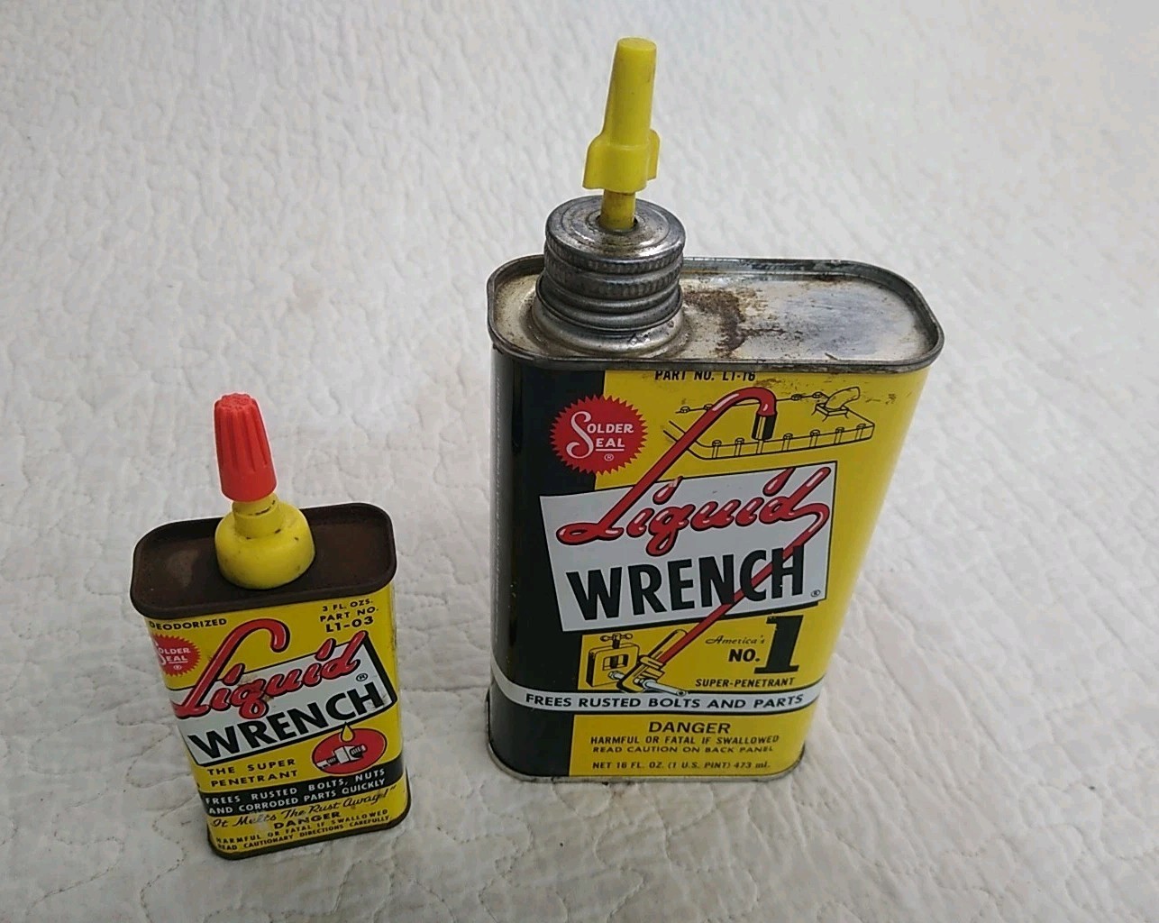  2 Vintage Liquid Wrench Tins . 