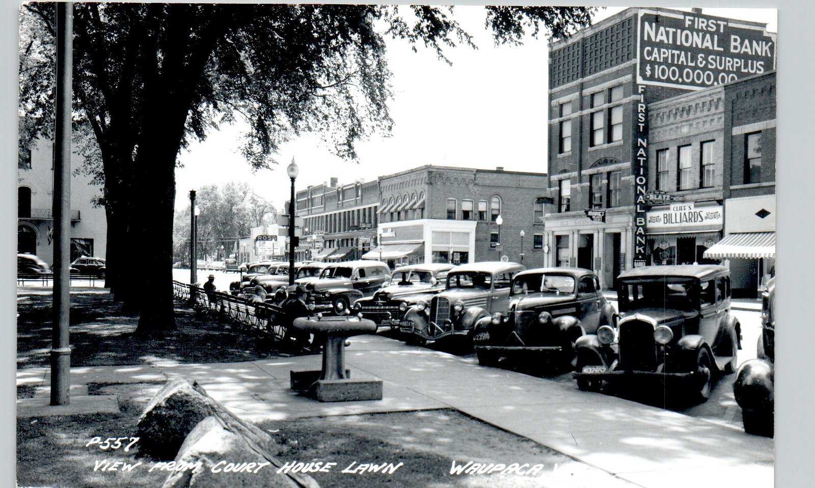 BUSY STREET SCENE waupaca wi c1950 postcard wisconsin real photo rppc downtown