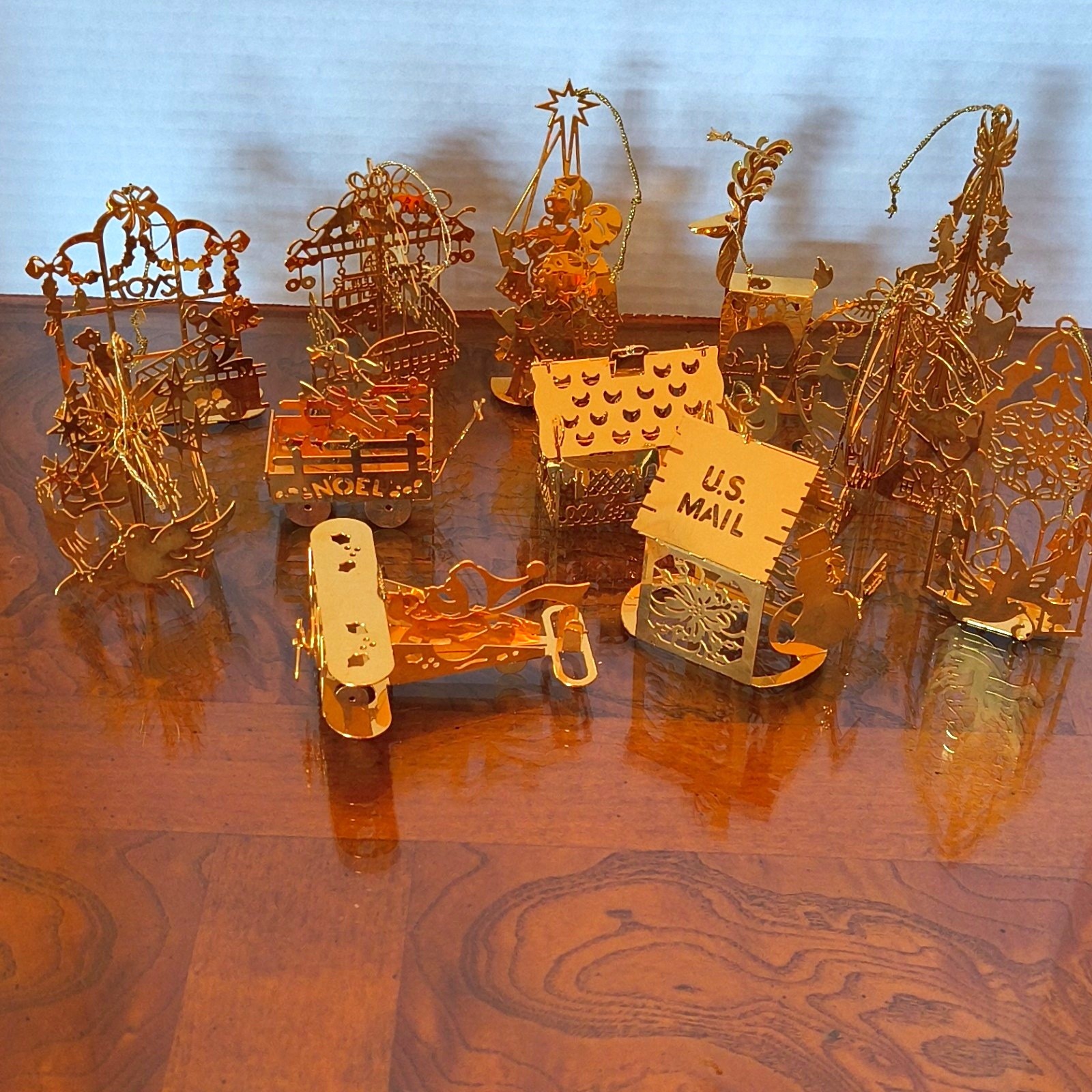 12 Danbury Mint Gold Toned Metal Christmas Ornaments, Post Office, Plane, etc. 12 Danbury Mint Gold Toned Metal Christmas Ornaments, Post Office, Plane, etc.