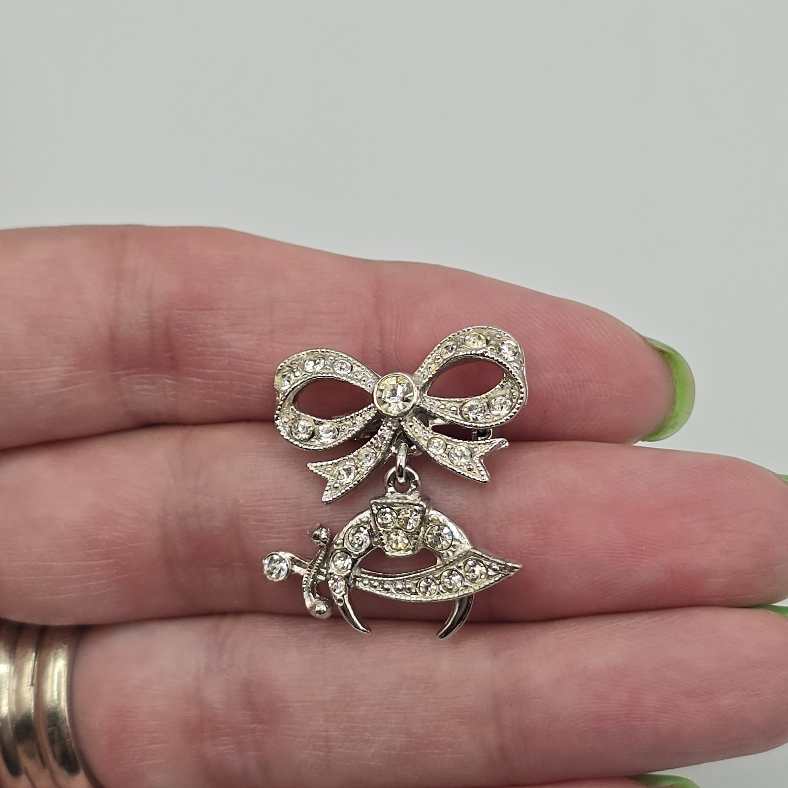 Vintage ORA Rhinestone Bow Shriners Scimitar Dangle Brooch Silver Tone Pin 1 Vintage ORA Rhinestone Bow Shriners Scimitar Dangle Brooch Silver Tone Pin 1