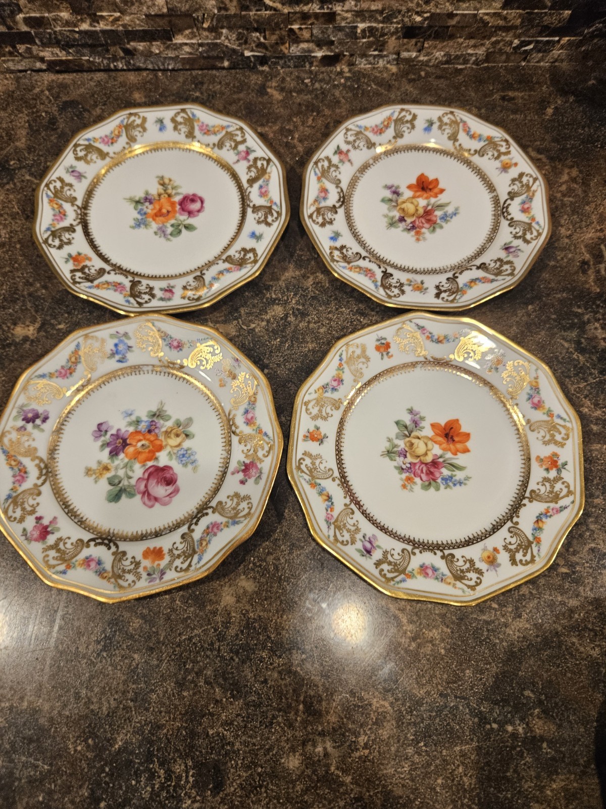 York 7350  Set of two different 4 German Porcelain Floral Gold Trimmed Plates 6\