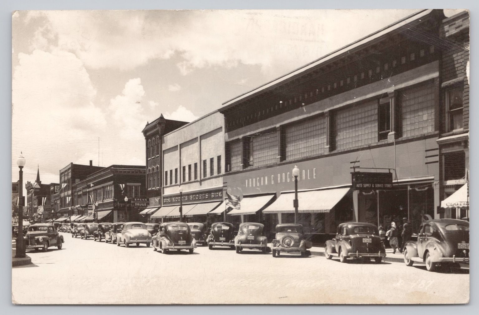 Vintage 1950 Alpena Michigan Main Street RPPC Postcard w/ Cars & Stores
